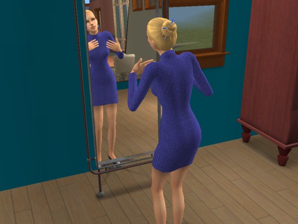 Rhonda looks in the mirror