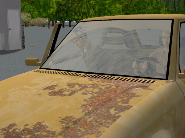 Simon climbs into the cruddy car