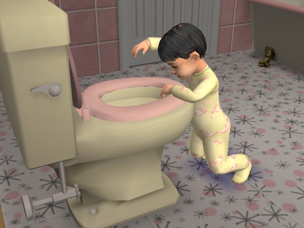 Marlee plays in the toilet