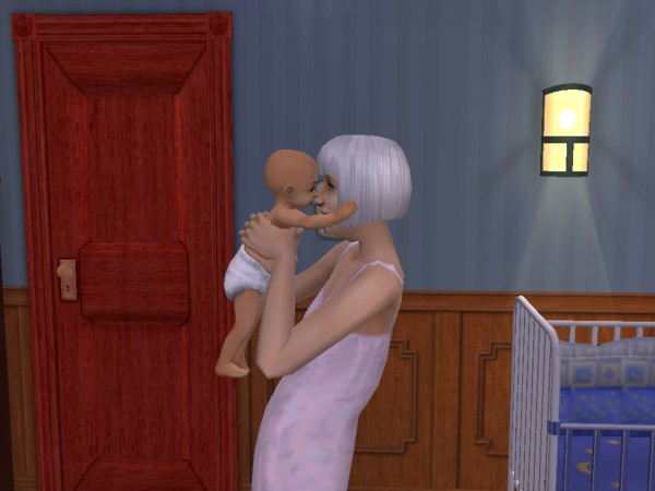 Grandma Nia holds little Devin