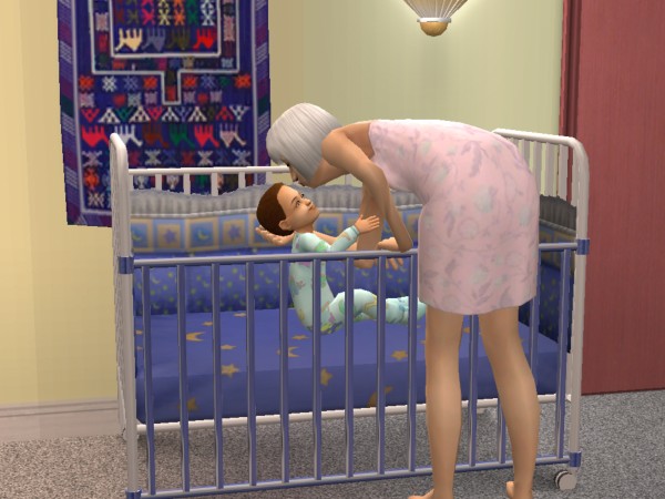 Nia tucks in her grandson Liam