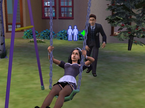 Liam pushes Kaylynn on the swings