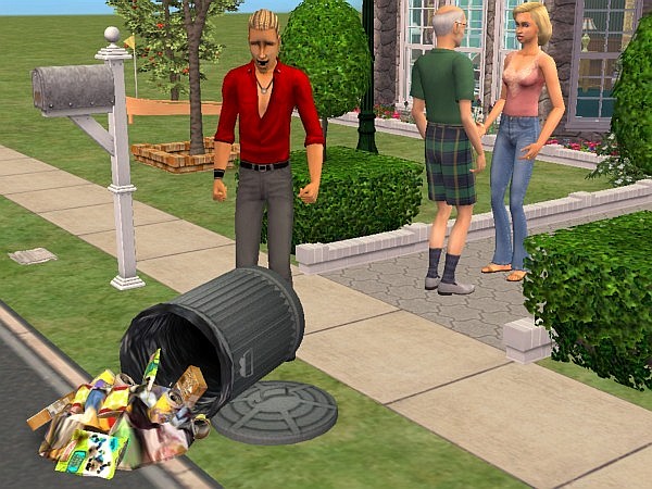 A hooligan knocks over the trashcan