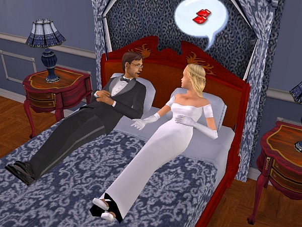 Vesta and Kenneth relax on the bed