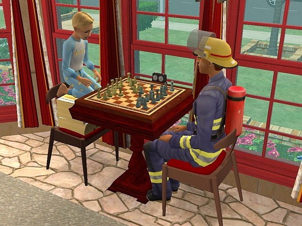 Kyle plays chess with Maura
